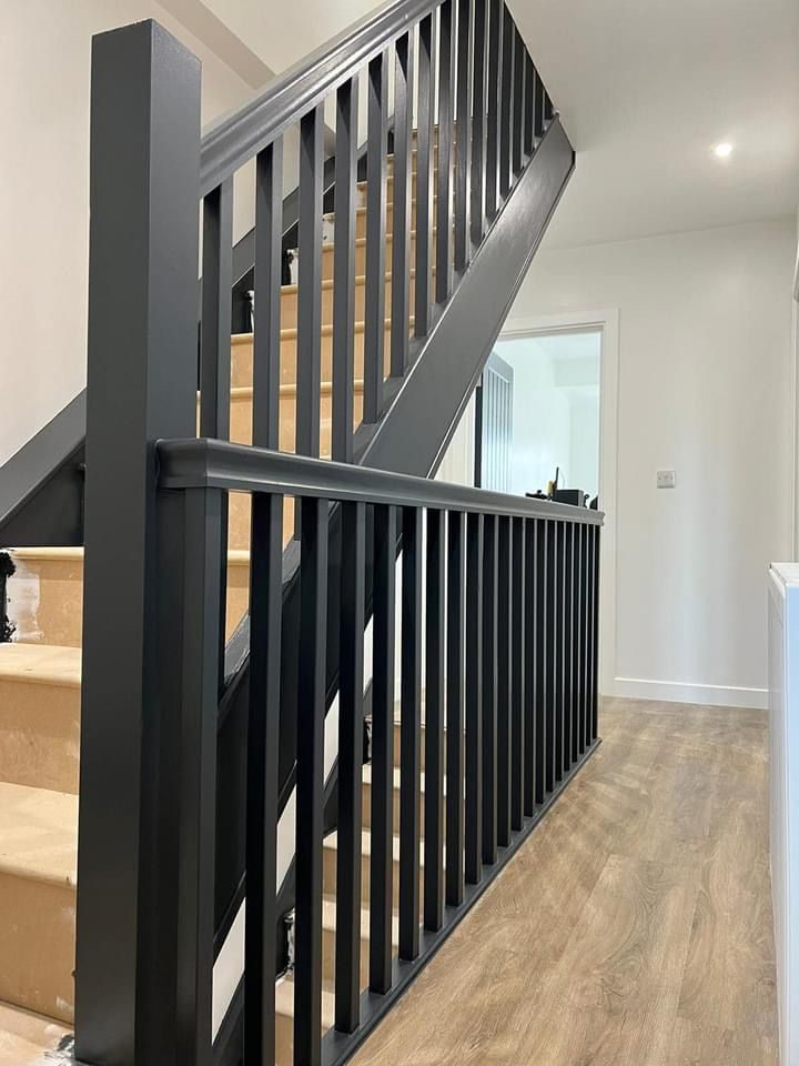 Black painted staircase banister